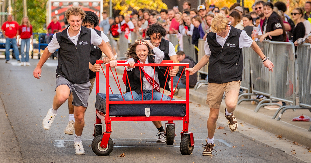 Ball State students participating in the annual homecoming bed race 