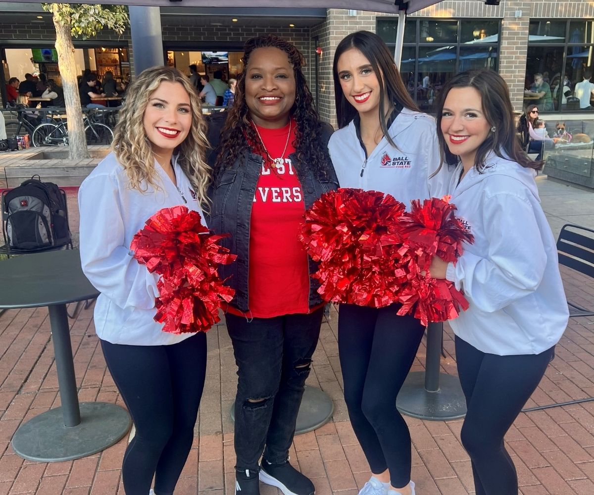 Indianapolis Club member with Ball State dancers at event 