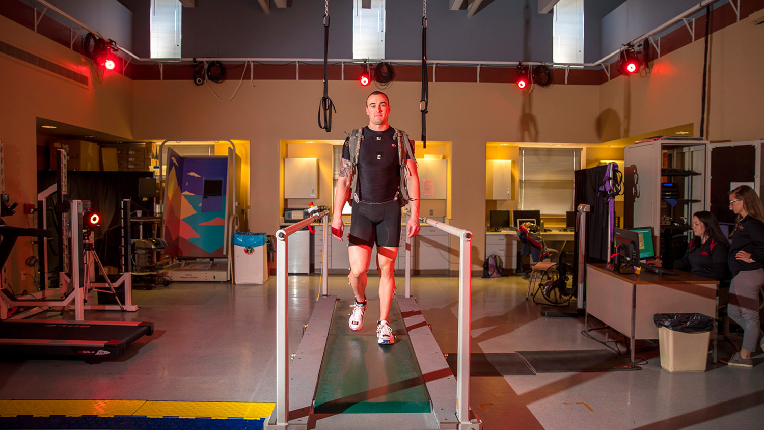 Research subject walks on a treadmill