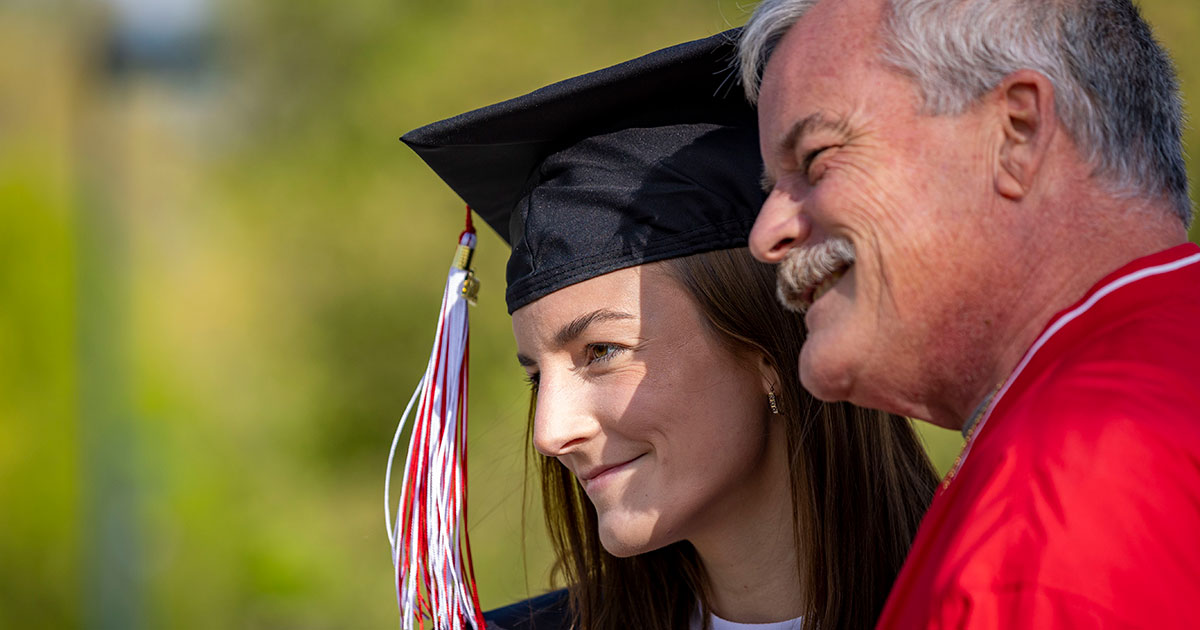 Graduate taking pictures - Ball State University Spring 2022 Commencement