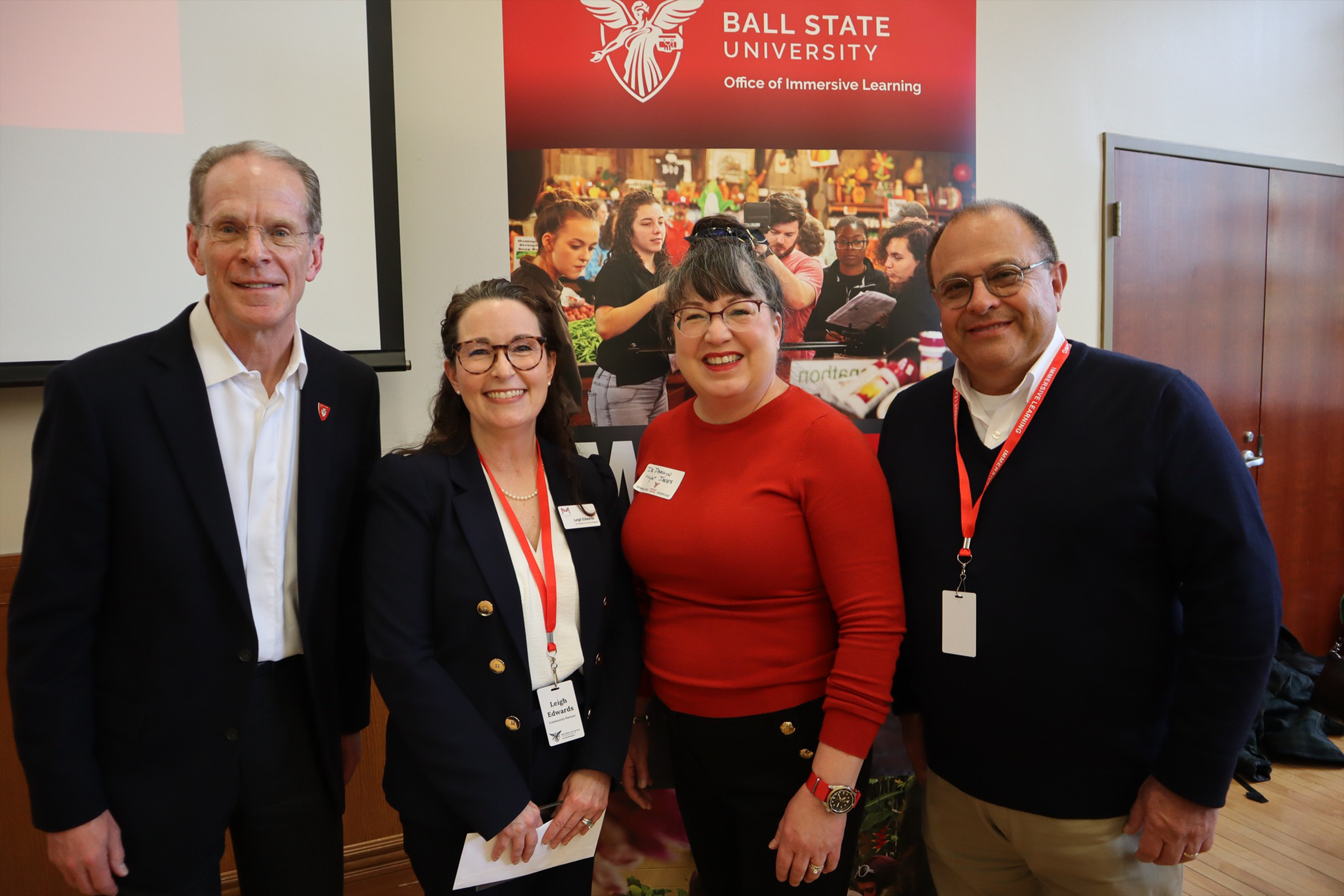 President Mearns standing with representatives from the Muncie Mission project.