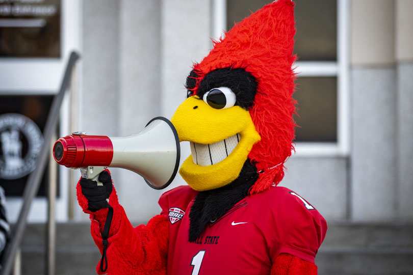 Charlie Cardinal with a megaphone