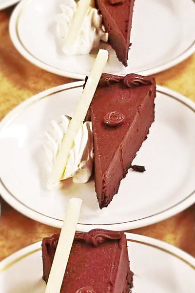 Row of chocolate cakes by University Catering