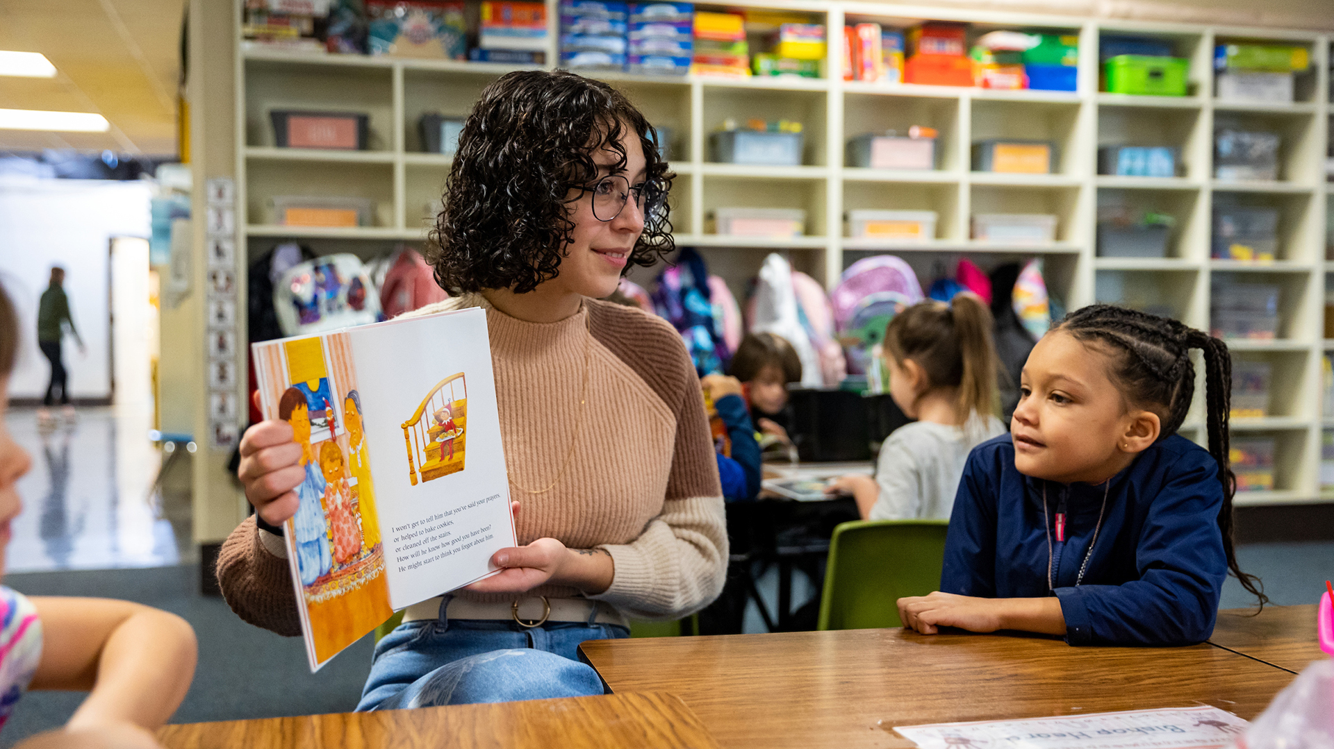 Teacher's college student working with a child