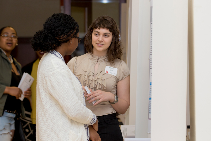 student making a poster presentation