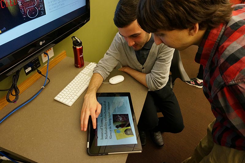 Two students working together.