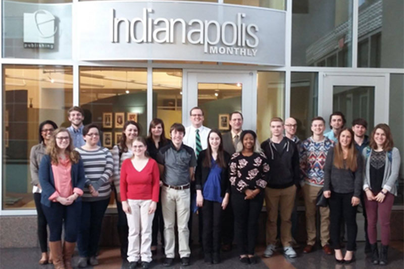Students standing in front of Indianapolis Monthly offices