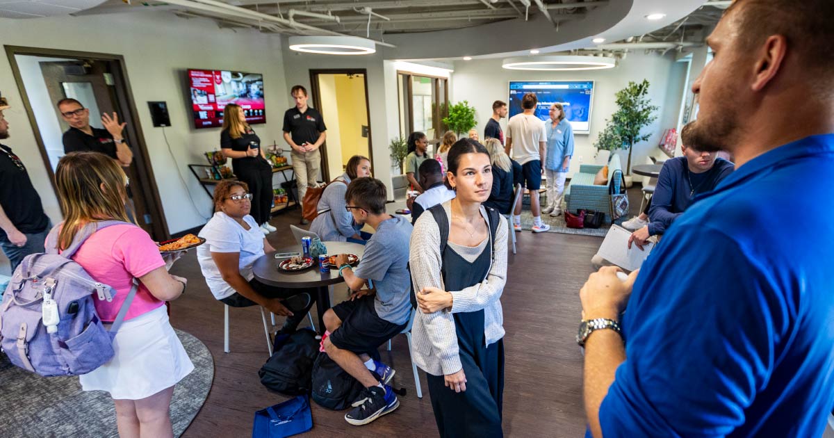 Ball State students networking inside the Connection Lounge.