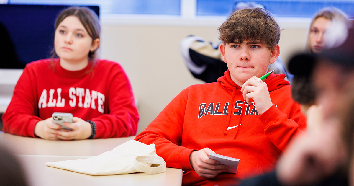 Students taking notes in class