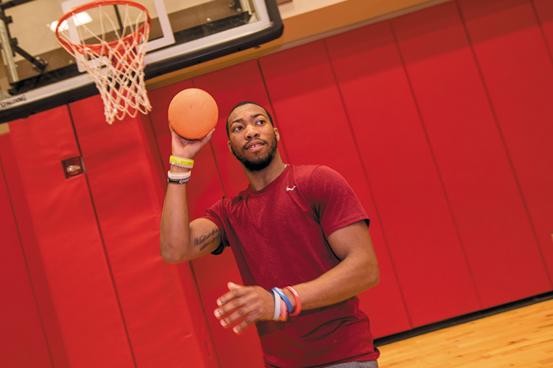 Student coaching a class.