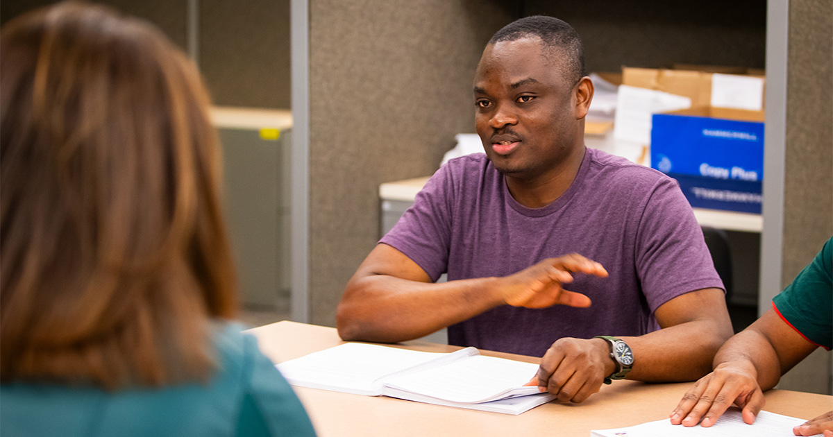 Adult sitting in a classroom