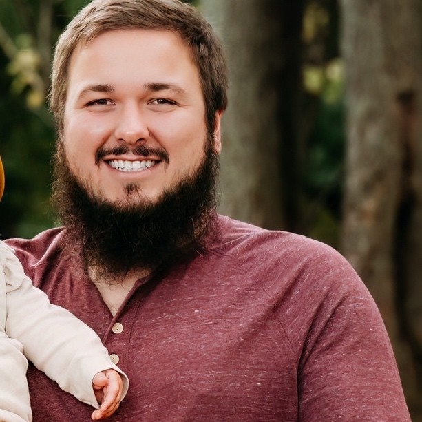 Image of Drake Dillard in a red shirt