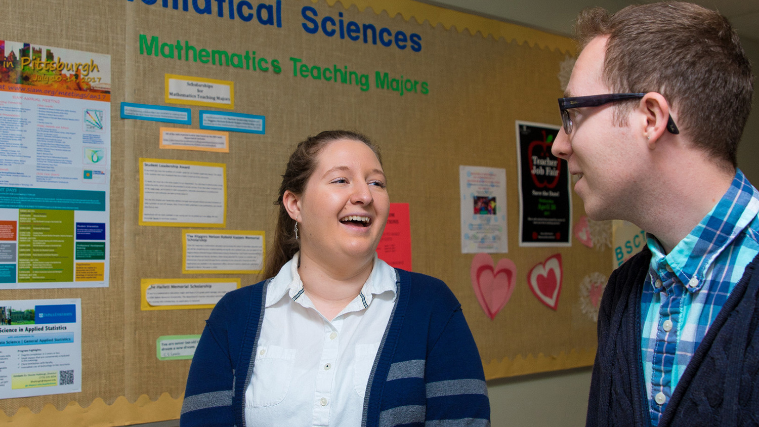 Student and faculty talkihg