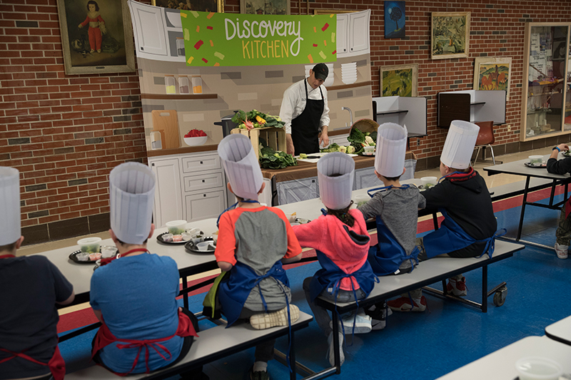 student preparing food