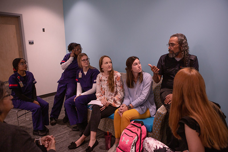 Students from different College of Health disciplines gather togethered