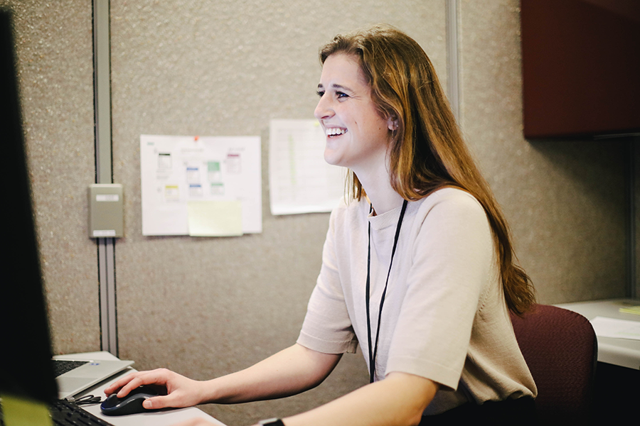 Anah Southard-Goebel smiling while seated in a cubicle