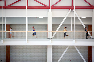 Photo of runners in a gym