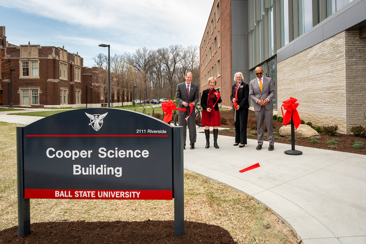 President Mearns and other cutting ribbon