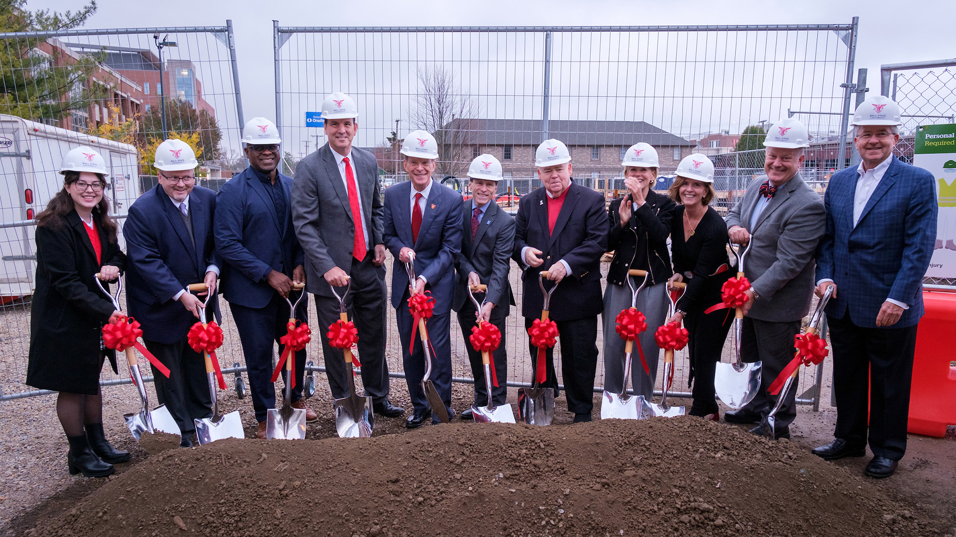 Board of Trustees Shoveling Dirt