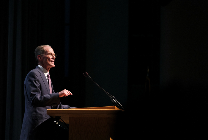 President Mearns behind podium looking from the left