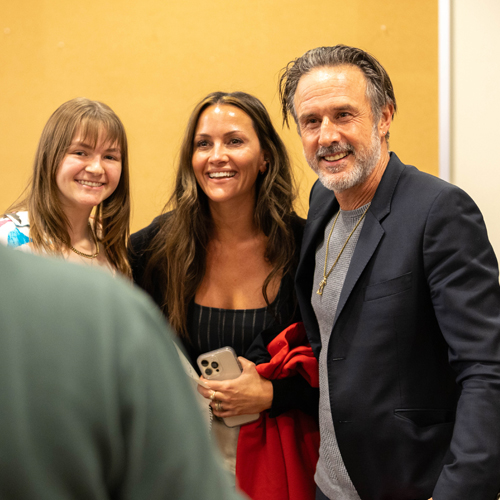 Christina and David Arquette with students