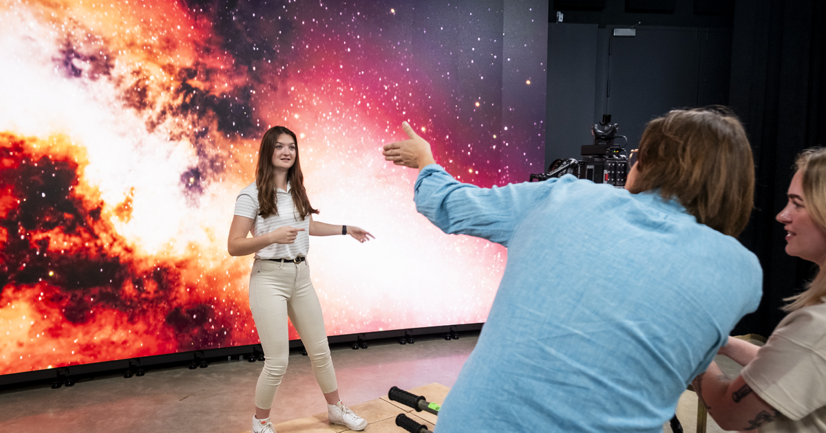 Student in front of visual effects screen
