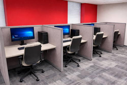 Computer-based testing lab with four private testing workstations