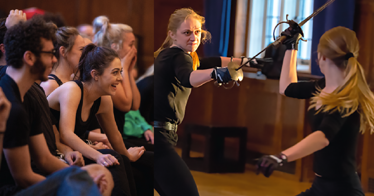 Students laugh watching a theater workshop while, alongside them, two performers practice a staged sword-fighting scene with protective gloves in a rehearsal space.