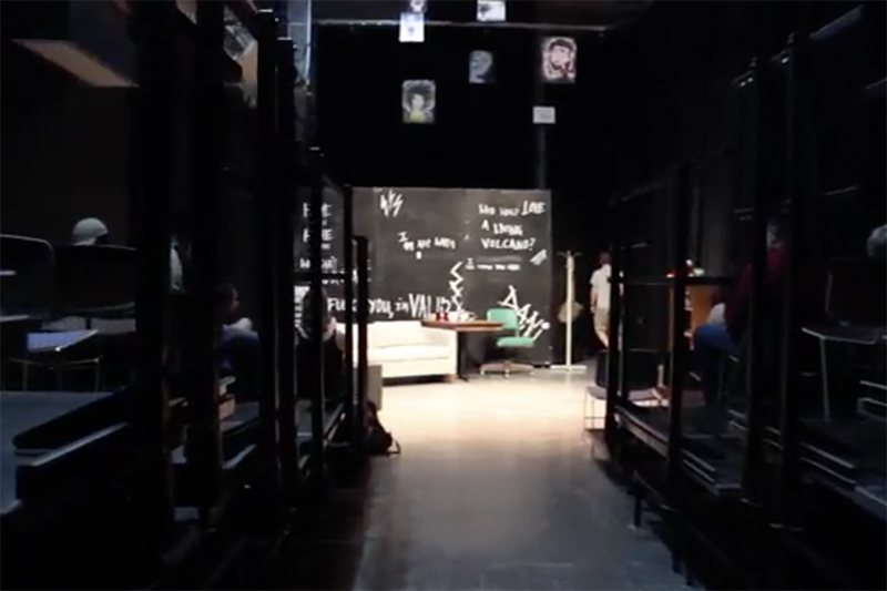 the set from behind the seats of the inside of Cave Studio