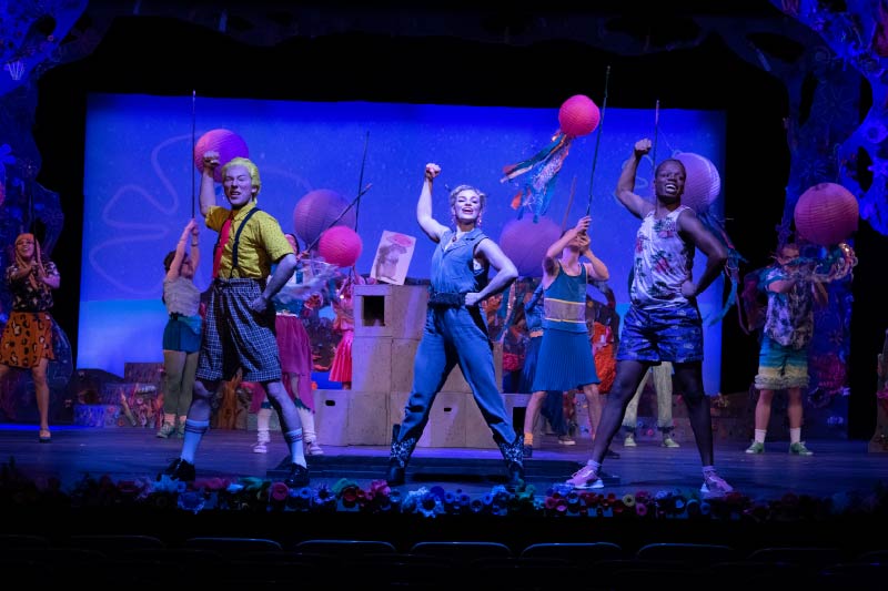 Ball State theatre students perform on stage.