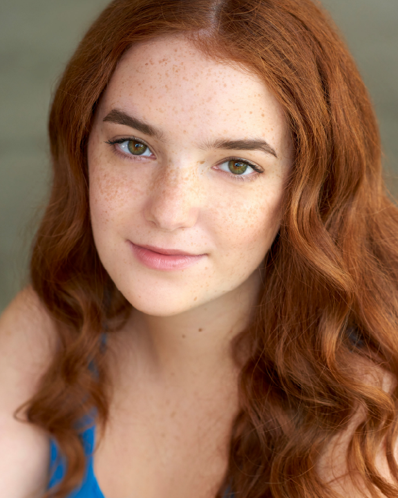Headshot of Izzy Lima.