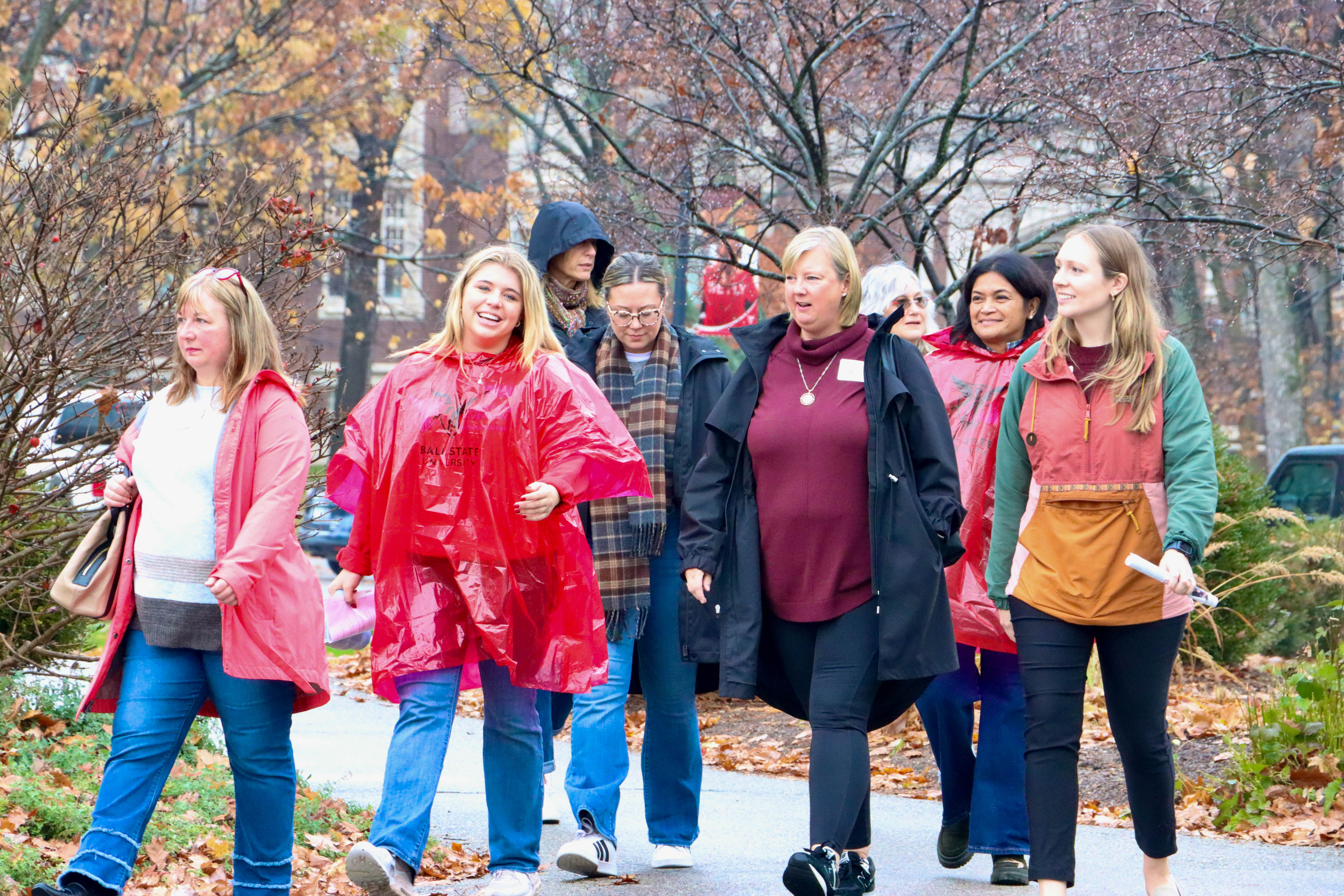 Counselors walk in a group across Ball State University's campus during Counselor Connection Day.