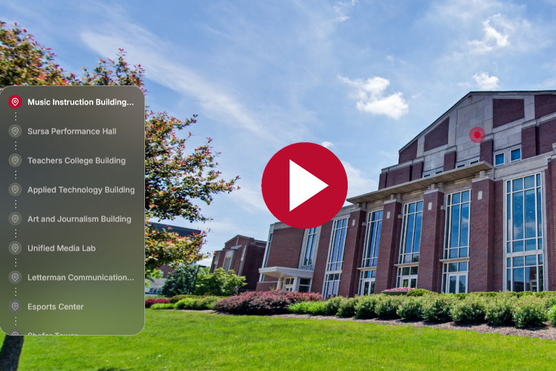 tour screenshot of sursa hall performance center with a menu on the left, a play button in the center and the music hall building in the background