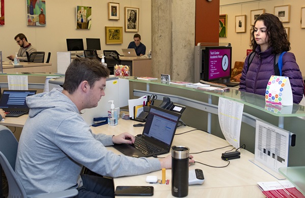 Student being helped at the Tech Center