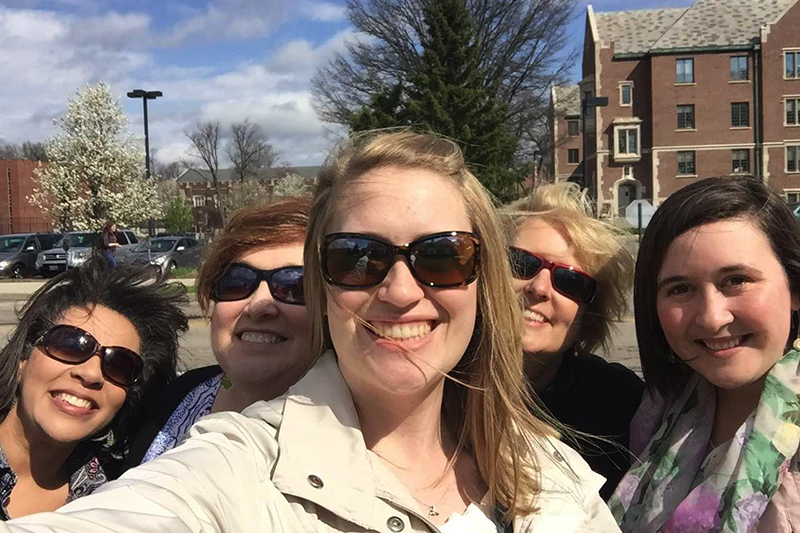 Ball State employees enjoy the outdoors by taking a selfie photo