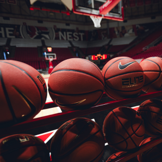 Basketballs under goal in Worthen Arena