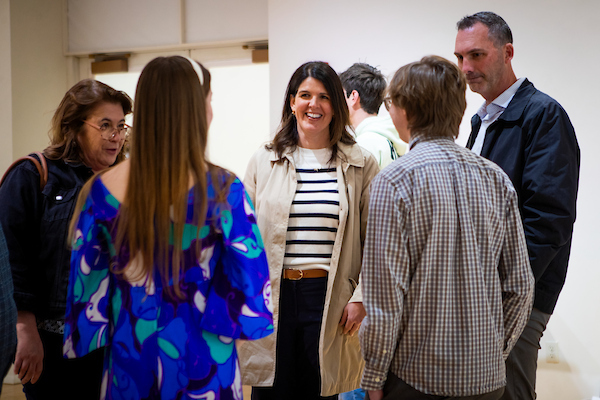 a group of people at a an art gallery