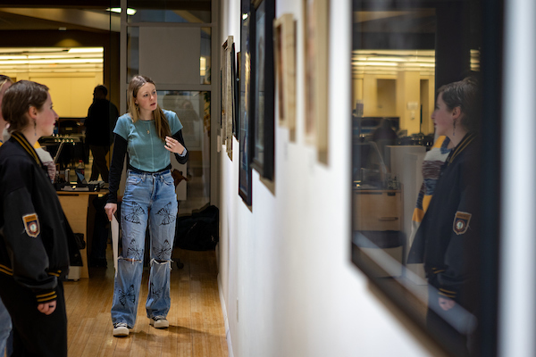 People viewing art in the Ned and Gloria Griner Gallery