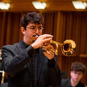 a jazz student performs onstage in Sursa Hall