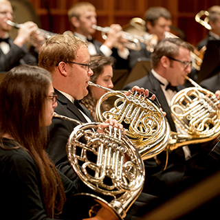brass musicians performing