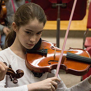 Girl playing a violin