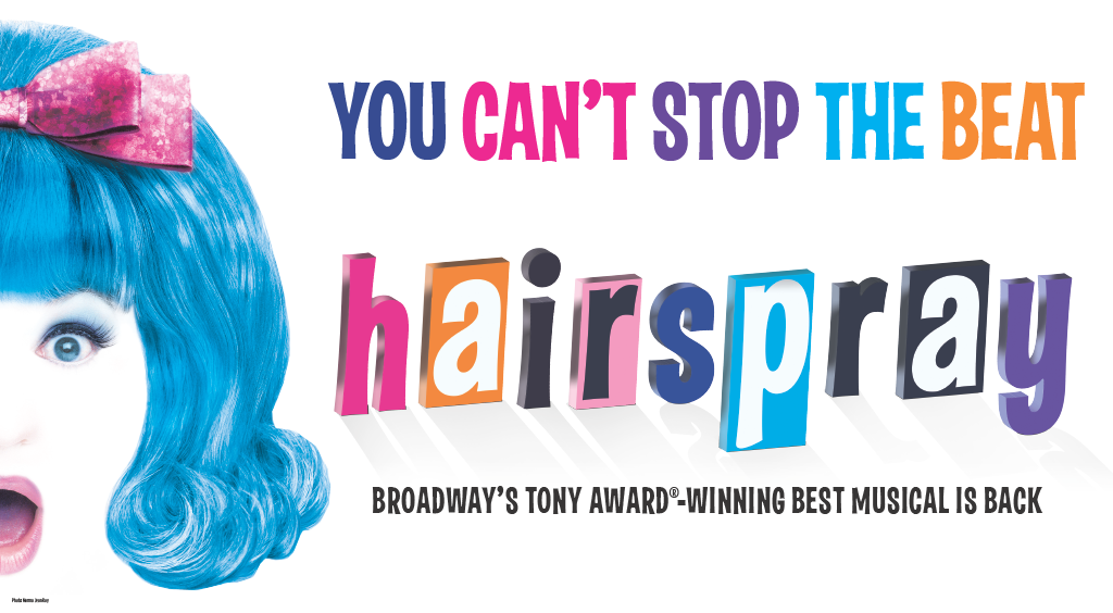 Hairspray logo (a woman with blue hair making a surprised face next to the title "Hairspray") and the tagline "You can't stop the beat"