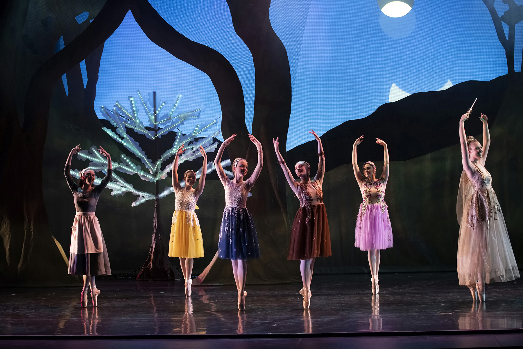 Department of Theatre and Dance cast dance on stage during rehearsal