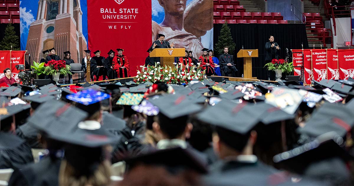 Graduates listening to speaker