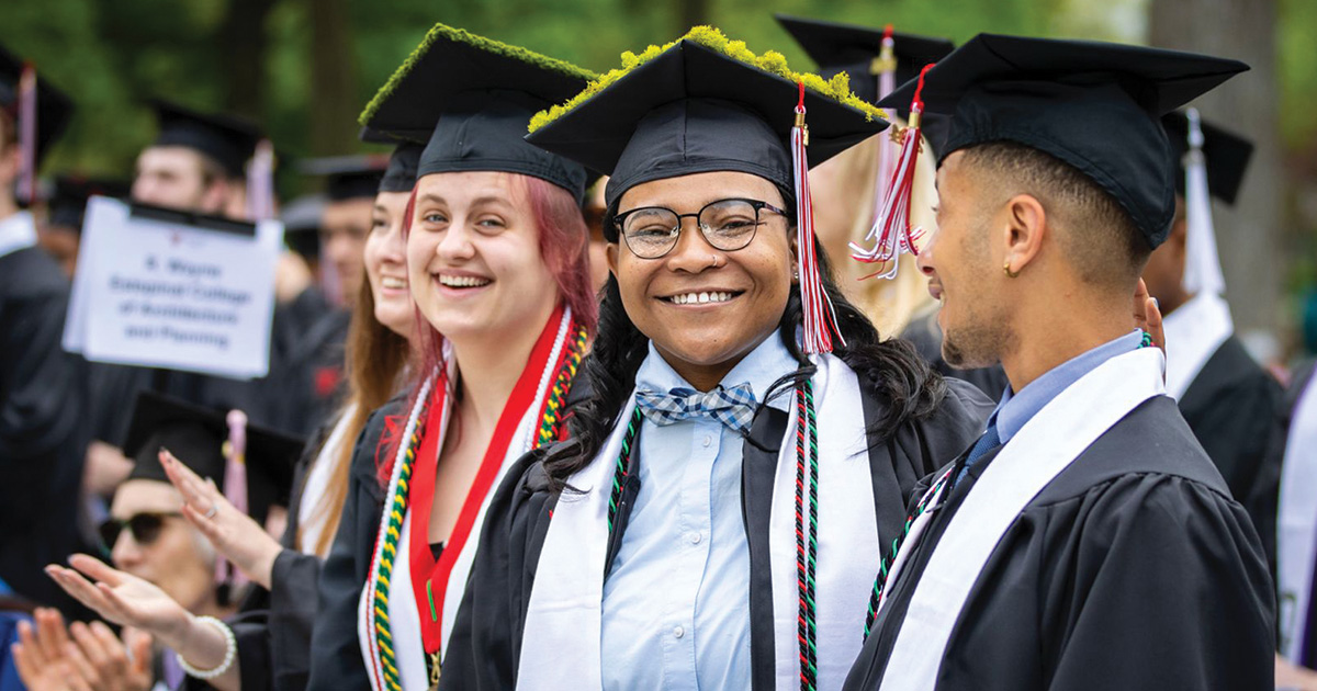 three students talking