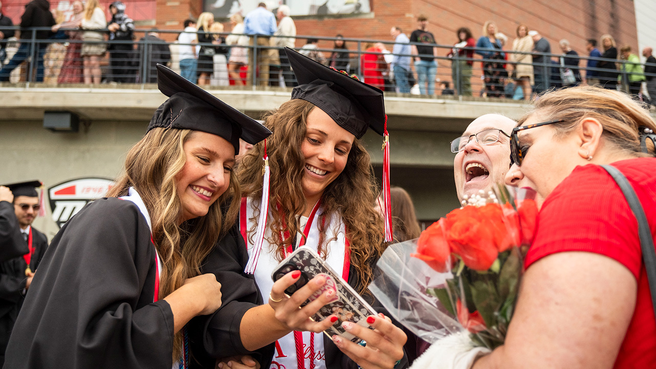 Students and family laughing