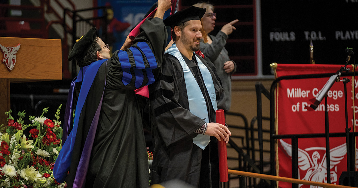 Doctoral student being hooded