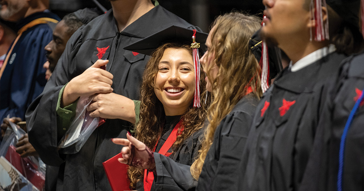 Student smiling with friends