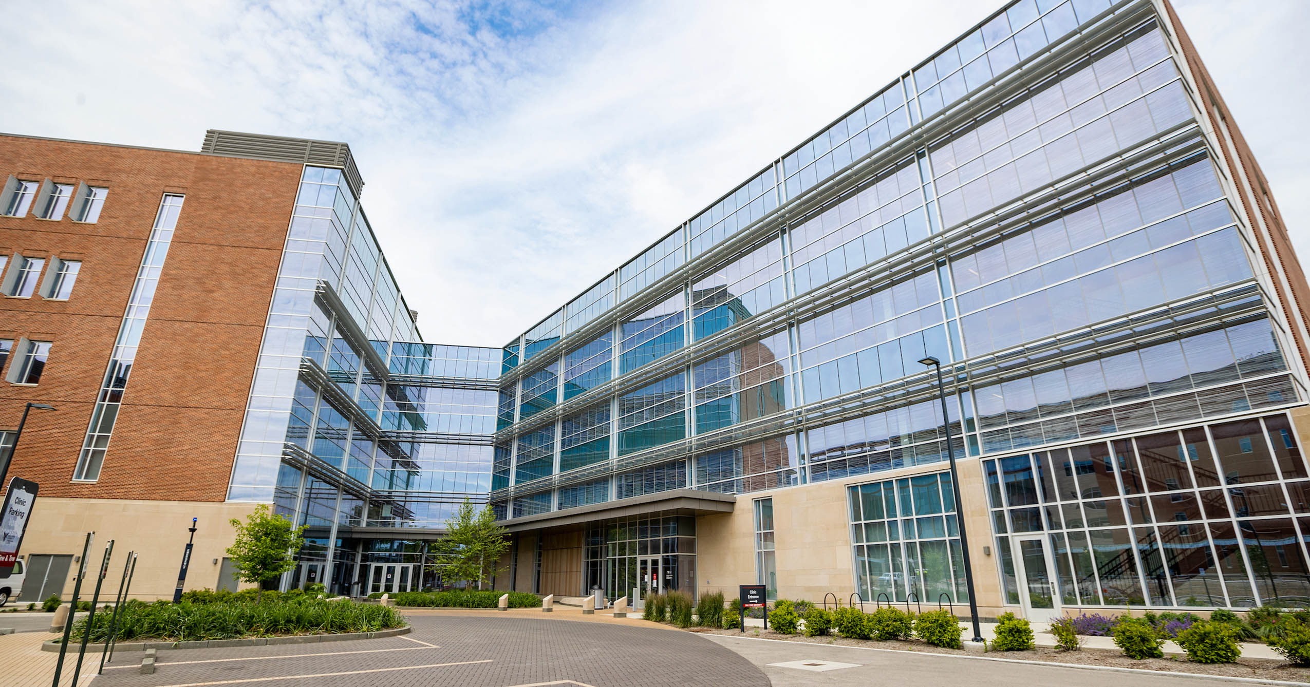 Exterior of Ball State University’s Health Professions Building, featuring brick and glass architecture.