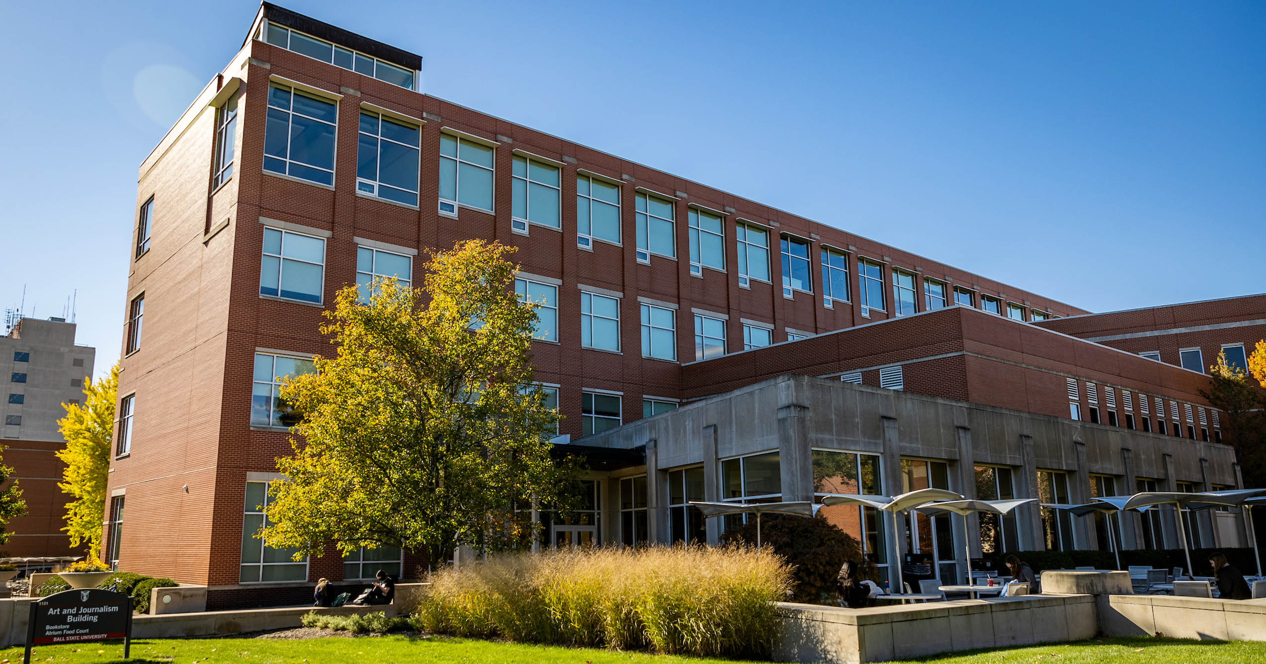 Exterior of Ball State University’s Art and Journalism Building on a sunny Fall day.